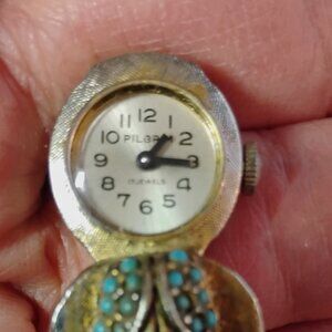 Ladies peak-a-boo Pilgrim watch